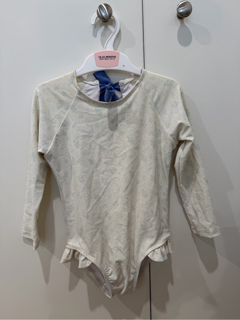 Minnow girls crème floral rashguard one piece